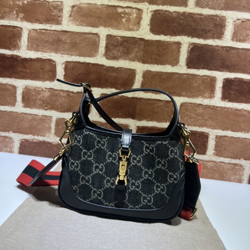 G*u*i top handle bags